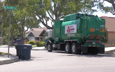 Athens garbage truck in Cerritos neighborhood